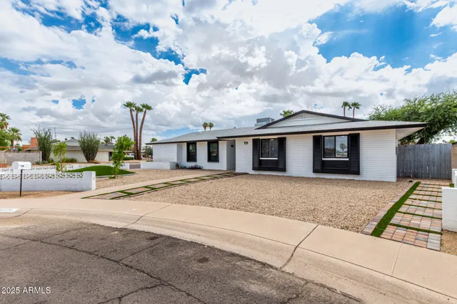 front view of a house with a street