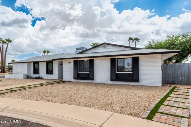 a front view of house with yard