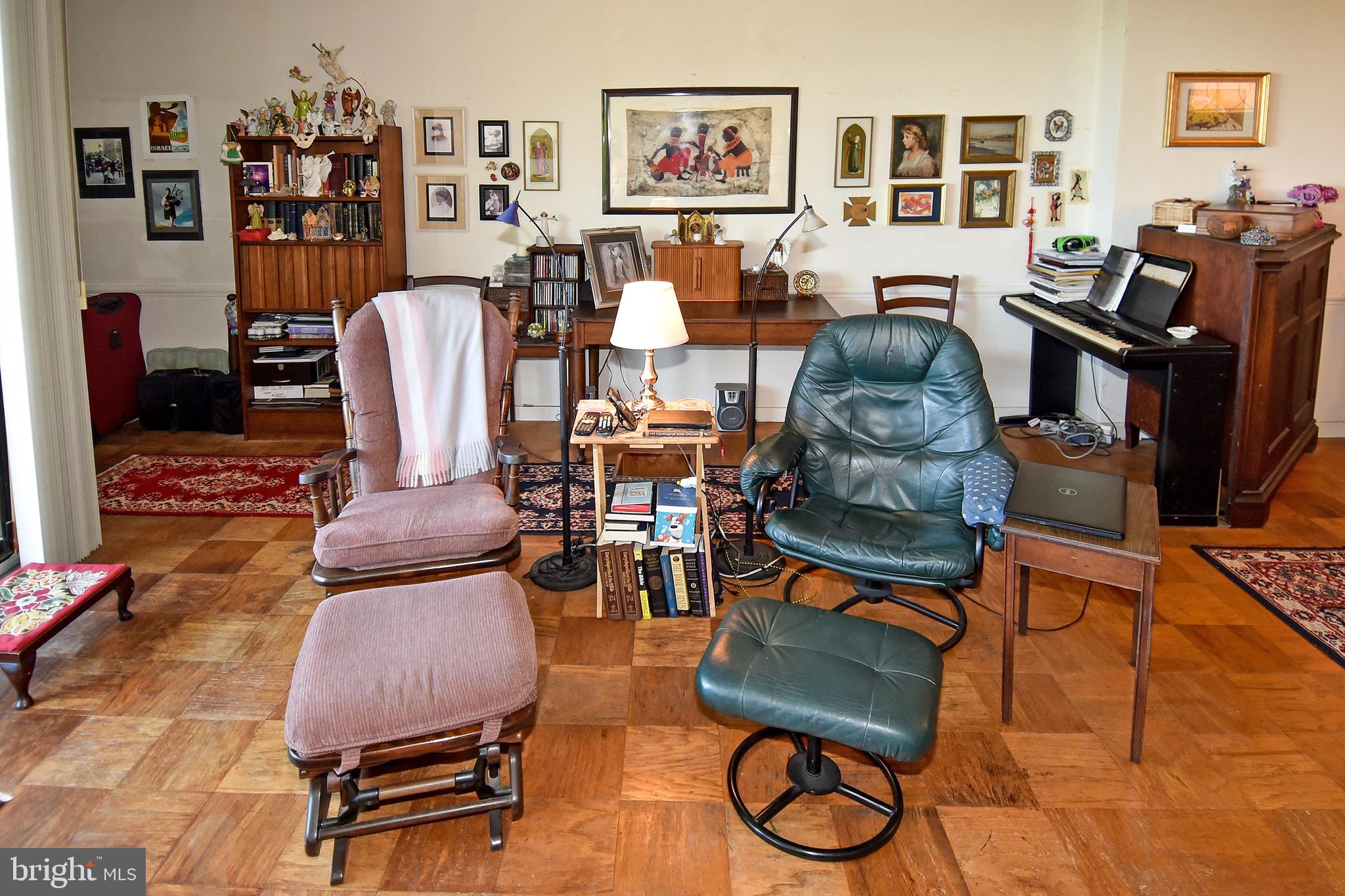 429 N Street Southwest, Unit S607 Washington, DC 20024 - Photo 11 of 55 a living room with furniture rug and wooden floor