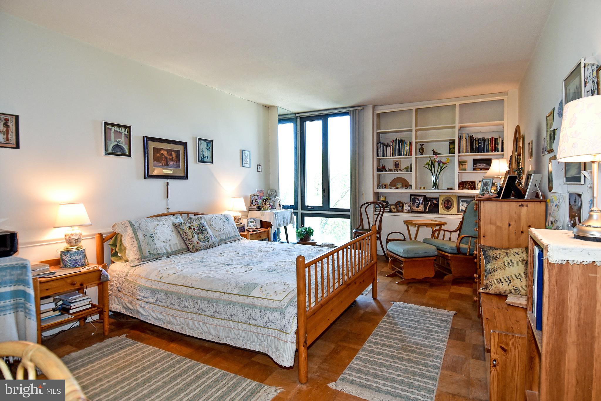 429 N Street Southwest, Unit S607 Washington, DC 20024 - Photo 21 of 55 a bedroom with a bed couch and a window