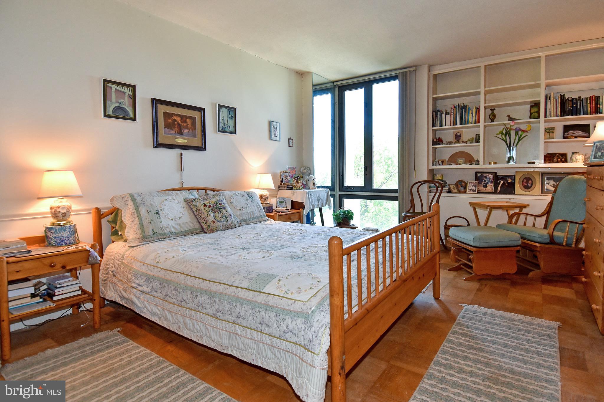 429 N Street Southwest, Unit S607 Washington, DC 20024 - Photo 22 of 55 a bed room with a bed and a chair