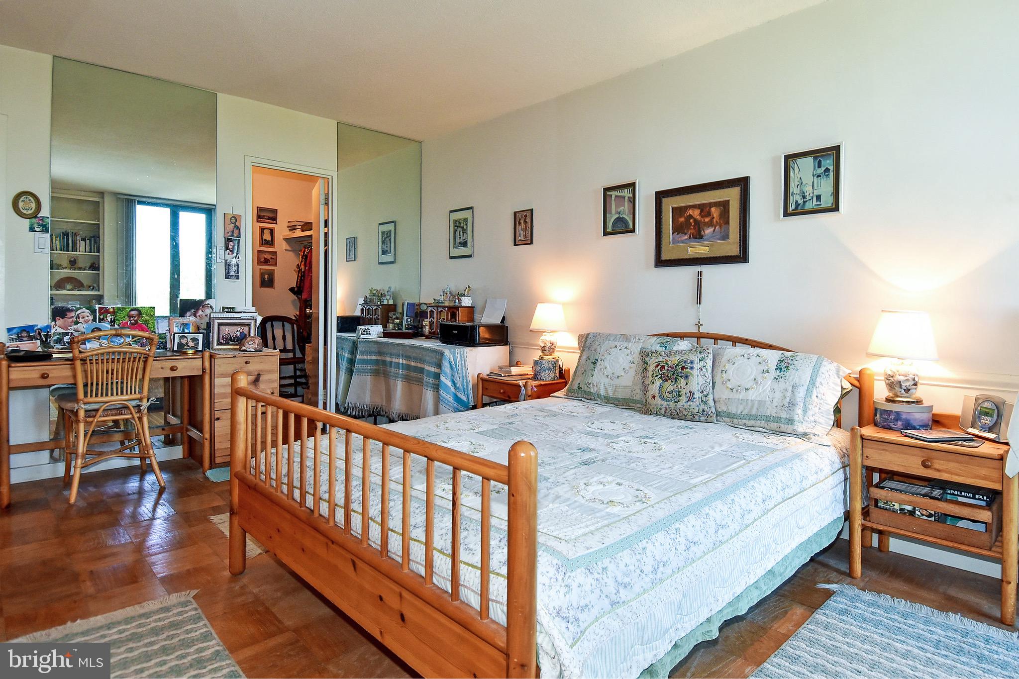 429 N Street Southwest, Unit S607 Washington, DC 20024 - Photo 24 of 55 a bedroom with a bed and wooden floor