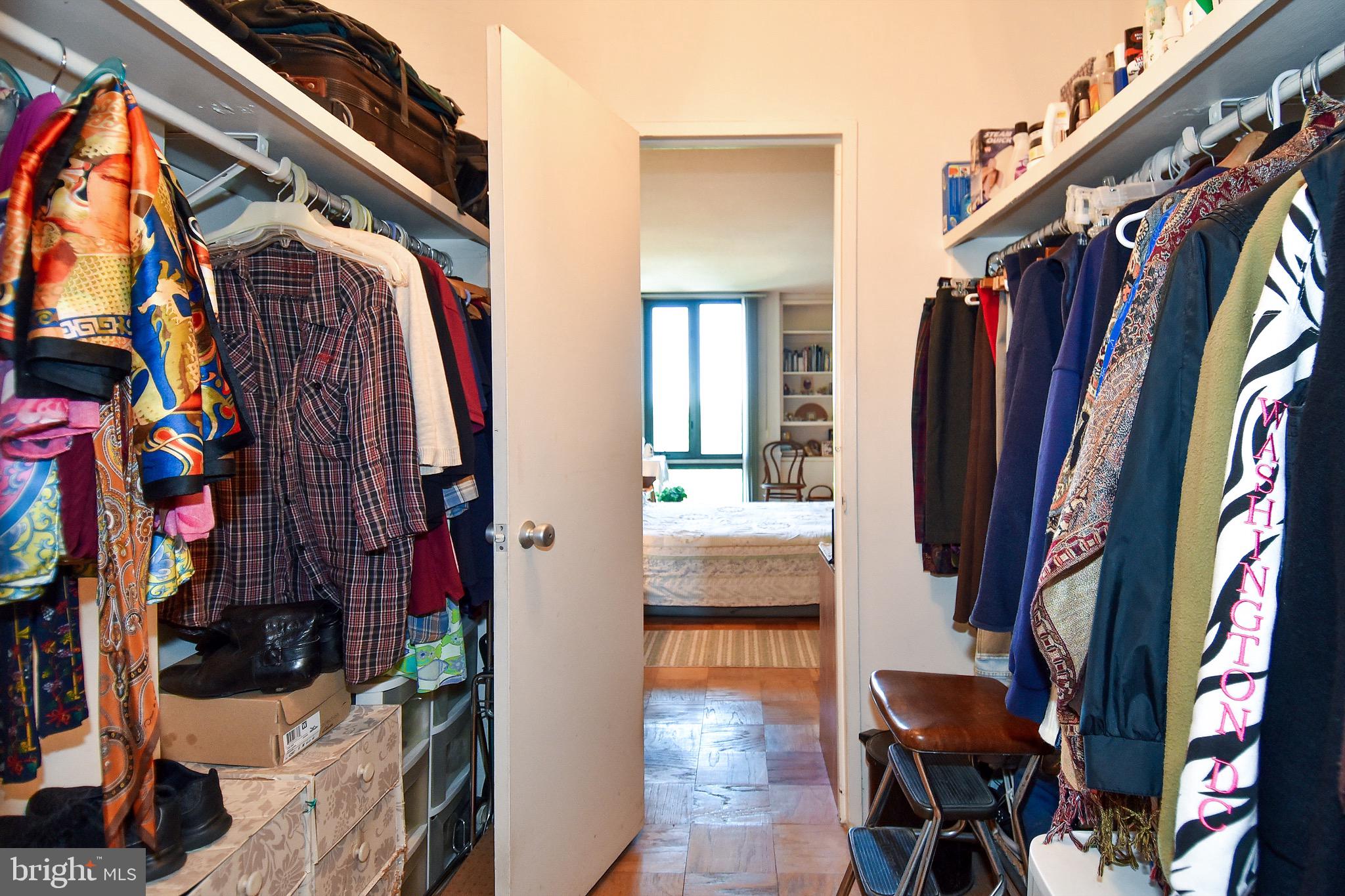 429 N Street Southwest, Unit S607 Washington, DC 20024 - Photo 28 of 55 a view of walk in closet with clothes and shoes