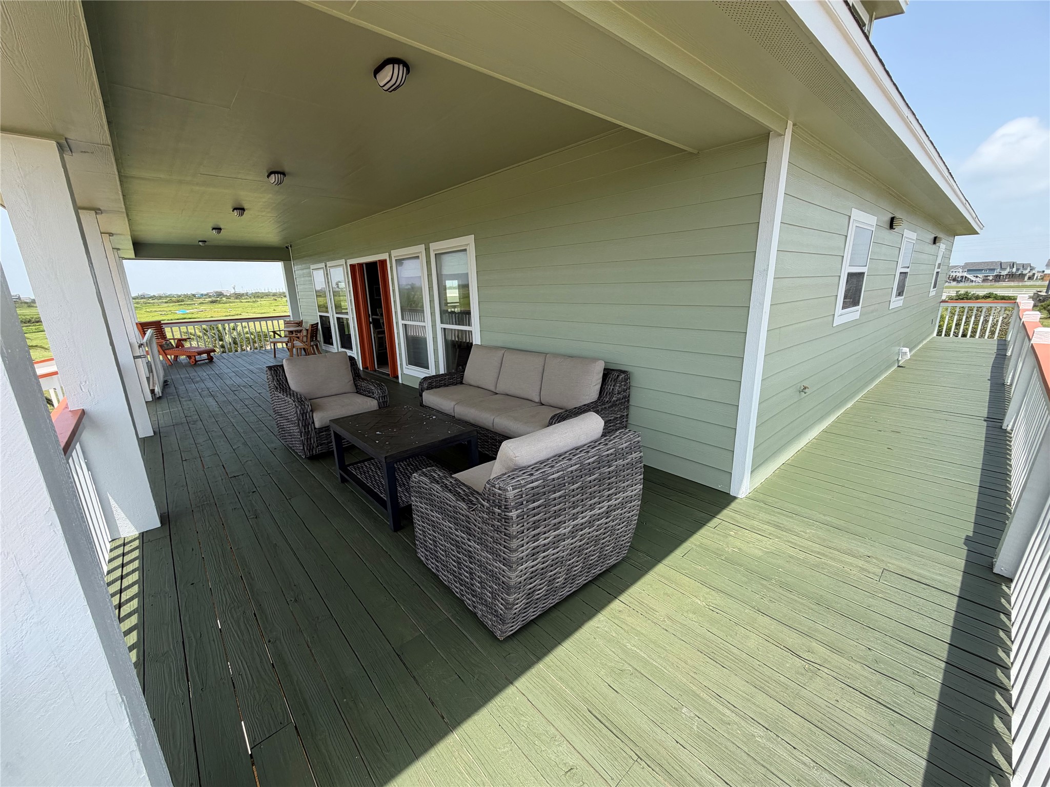 979 Rancho Carribe Drive Crystal Beach, TX 77650 - Photo 18 of 50 View of deck from the south east corner