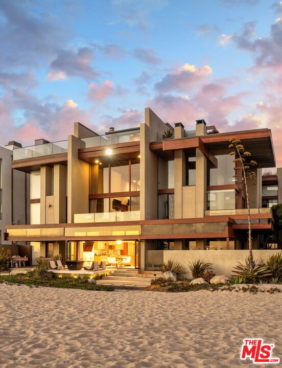 front view of a house with a blue house