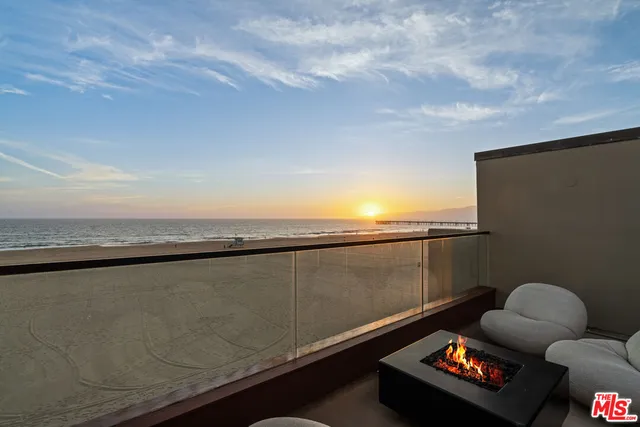 a view of a terrace with furniture