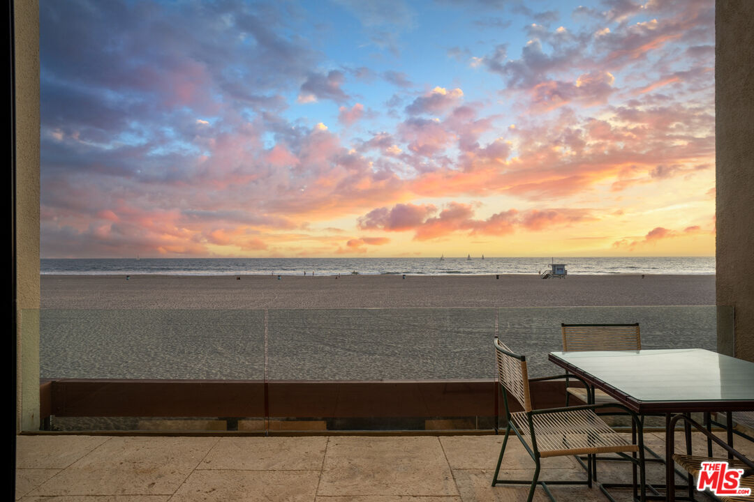 3817 Ocean Front Walk Marina del Rey, CA 90292 - Photo 22 of 25 a terrace with a table and chairs