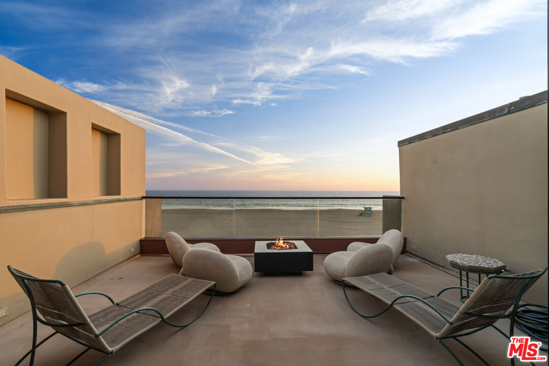 3817 Ocean Front Walk Marina del Rey, CA 90292 - Photo 24 of 25 a terrace with outdoor seating and garden