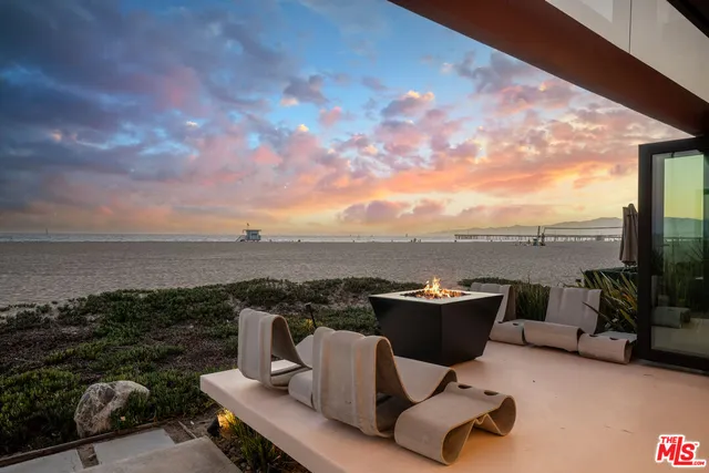a view of a terrace with furniture