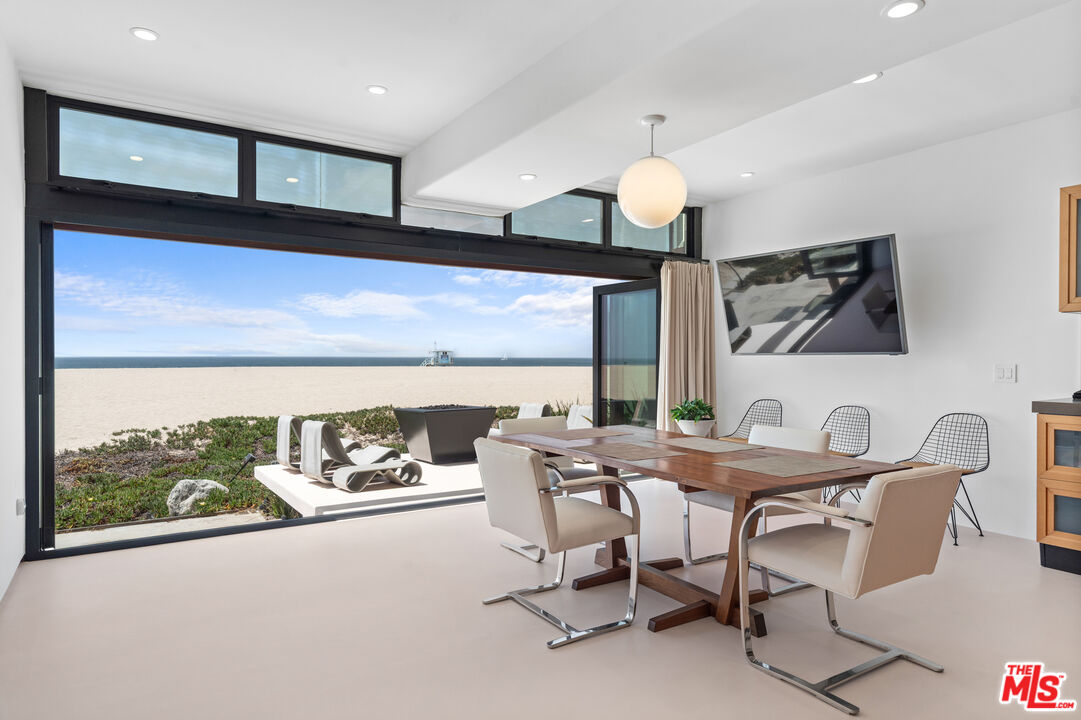 3817 Ocean Front Walk Marina del Rey, CA 90292 - Photo 8 of 25 a view of a dining room with furniture window and outside view