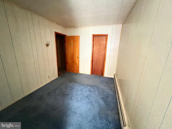 a view of hallway with closet