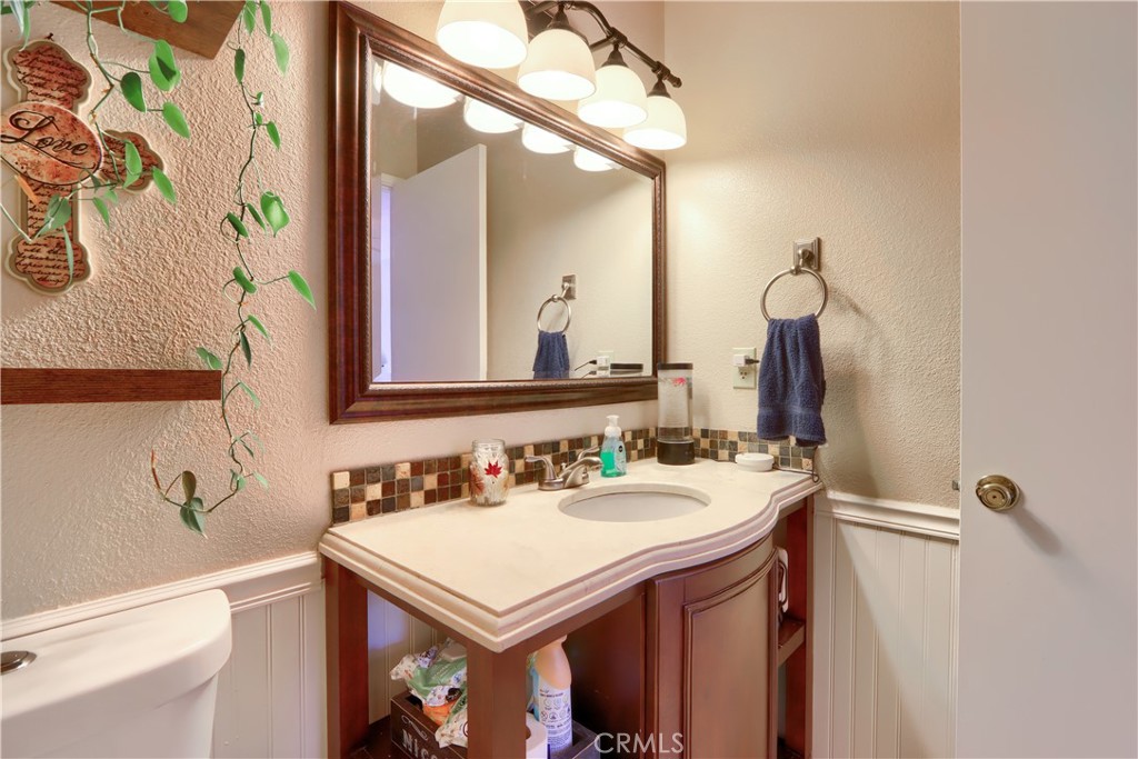 50840 Smoke Tree Trail Bass Lake, CA 93604 - Photo 32 of 36 a bathroom with a sink and a mirror