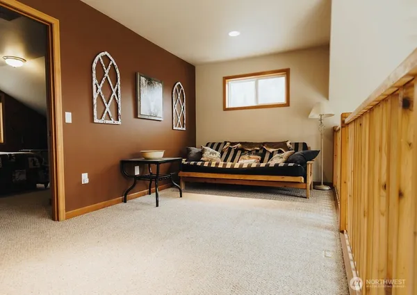 a bedroom with a bed and a table in it