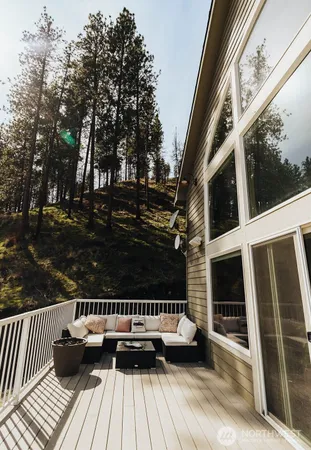 a view of balcony with furniture
