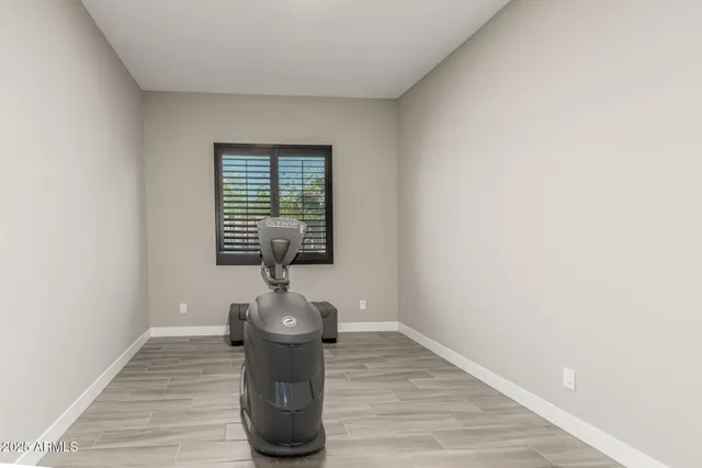 a spacious bathroom with a shower and a sink