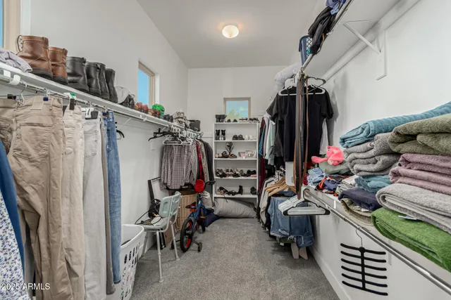 a view of room with walk in closet