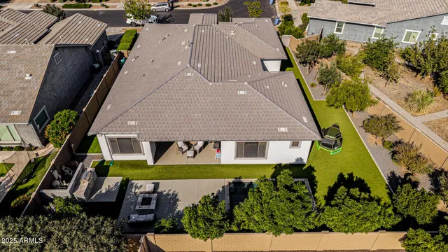 an aerial view of a house with swimming pool