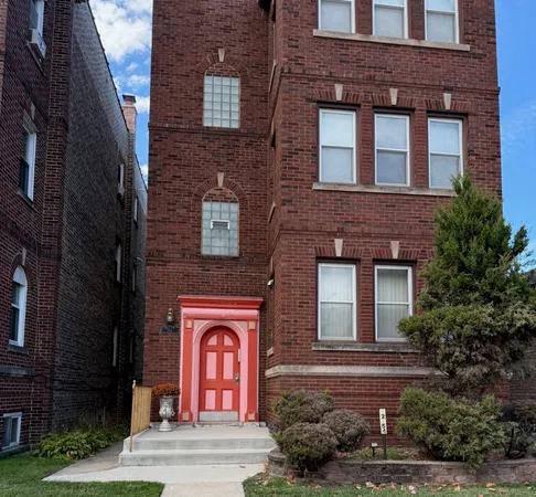 a front view of a building with yard