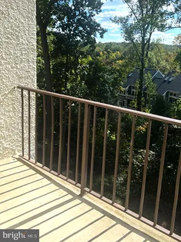 a kitchen with stainless steel appliances granite countertop a sink a stove and cabinets