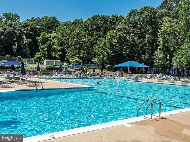 a view of a golf course with a lake view