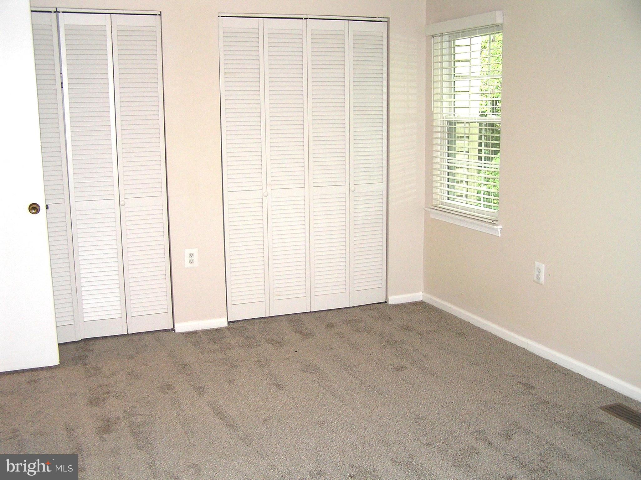 10053 Chestnut Wood Lane Burke, VA 22015 - Photo 12 of 28 an empty room with windows