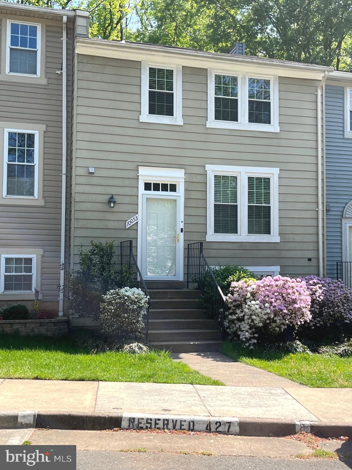 10053 Chestnut Wood Lane Burke, VA 22015 - Photo 2 of 28 a front view of a house