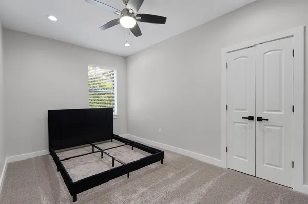 a living room with couch and a window