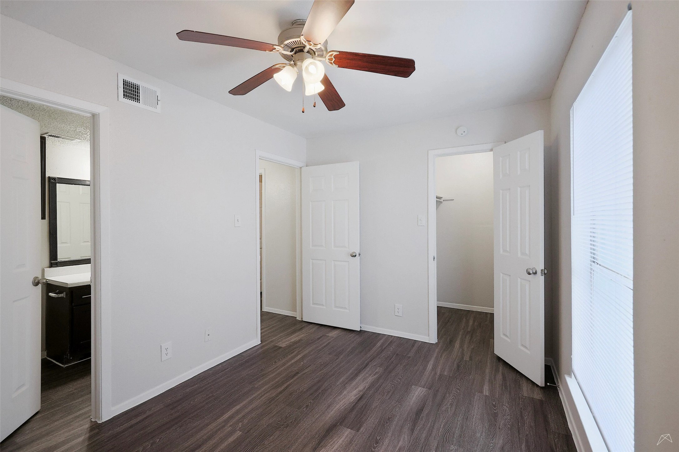 6808 South I-35 Frontage Road, Unit 202 Austin, TX 78745 - Photo 17 of 21 a view of a hallway with wooden floor