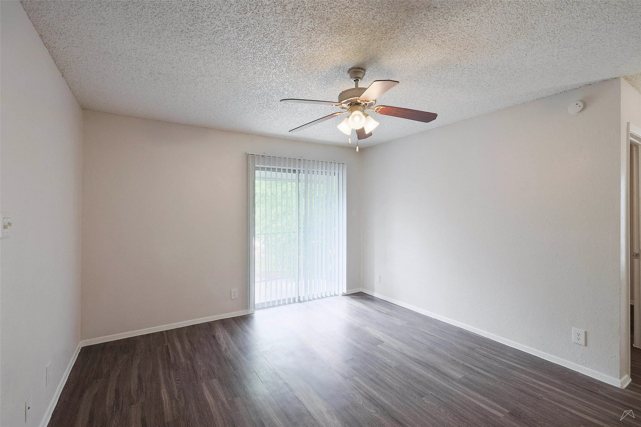 6808 South I-35 Frontage Road, Unit 202 Austin, TX 78745 - Photo 8 of 21 a view of empty room with wooden floor