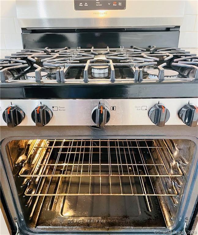 31 Brainerd Road, Unit 1 Branford, CT 06405 - Photo 5 of 17 a close view of a stove