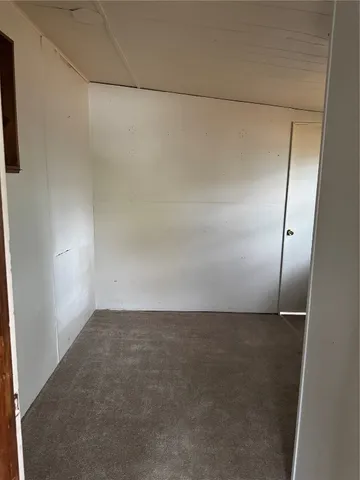 an empty room with closet