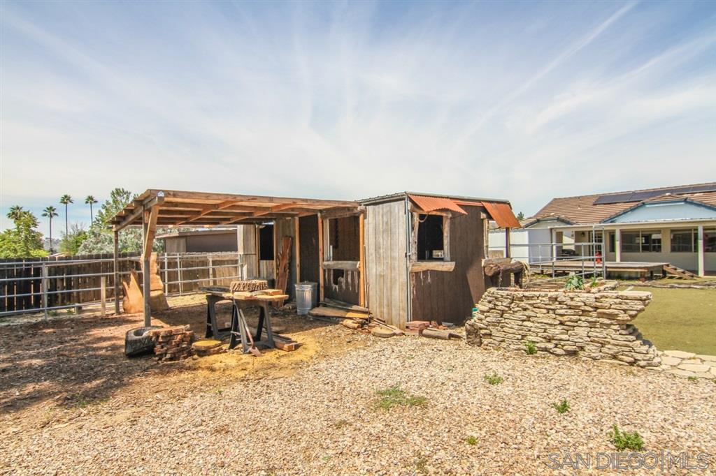 24263 Del Amo Road Ramona, CA 92065 - Photo 21 of 23 Nice size backyard with shed that could be a tack room