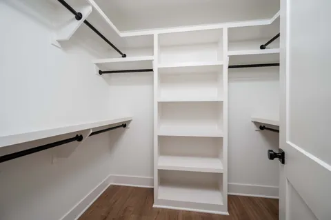 a view of an empty walk in closet