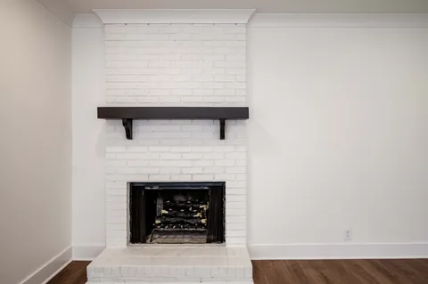 a living room with a fireplace