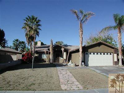 68180 Hermosillo Road Cathedral City, CA 92234 - Photo 1 of 18 a front view of a house with palm trees