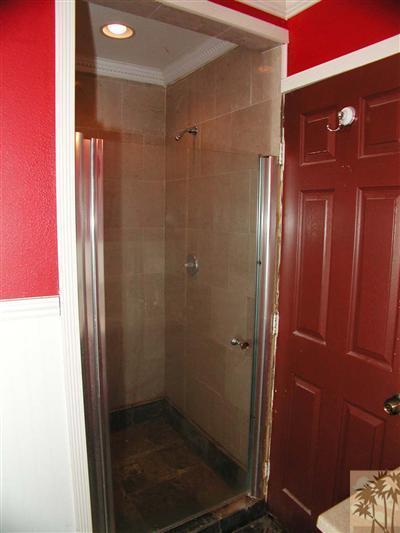 68180 Hermosillo Road Cathedral City, CA 92234 - Photo 8 of 18 a bathroom with a glass shower door