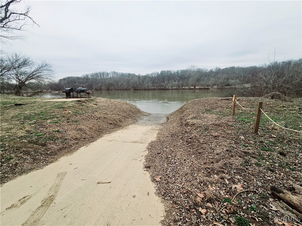 1198 Lickinghole Road Goochland, VA 23063 - Photo 17 of 20 a view of a lake with houses in the back