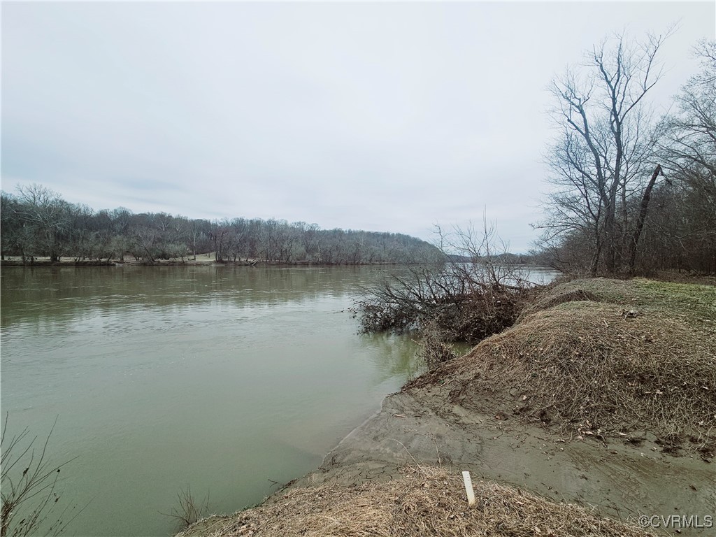 1198 Lickinghole Road Goochland, VA 23063 - Photo 18 of 20 a view of a lake with houses in the back