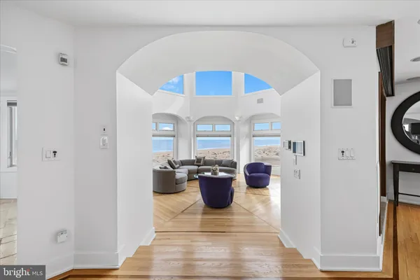 a kitchen with granite countertop lots of wooden cabinets a sink and a granite counter tops