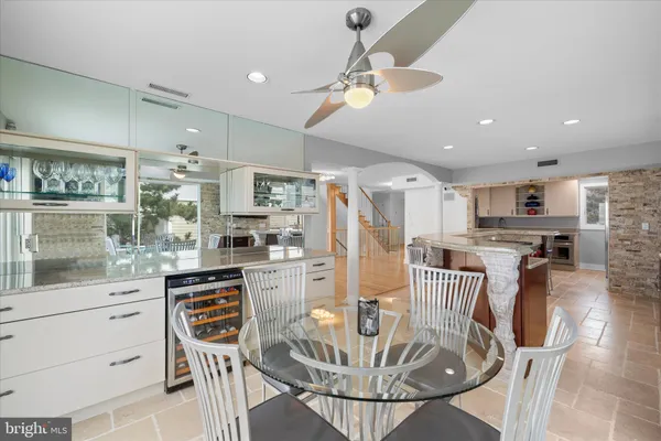 a bedroom with a bed window and walk in closet