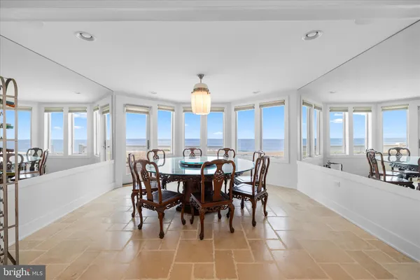 a spacious bathroom with a double vanity sink and a mirror