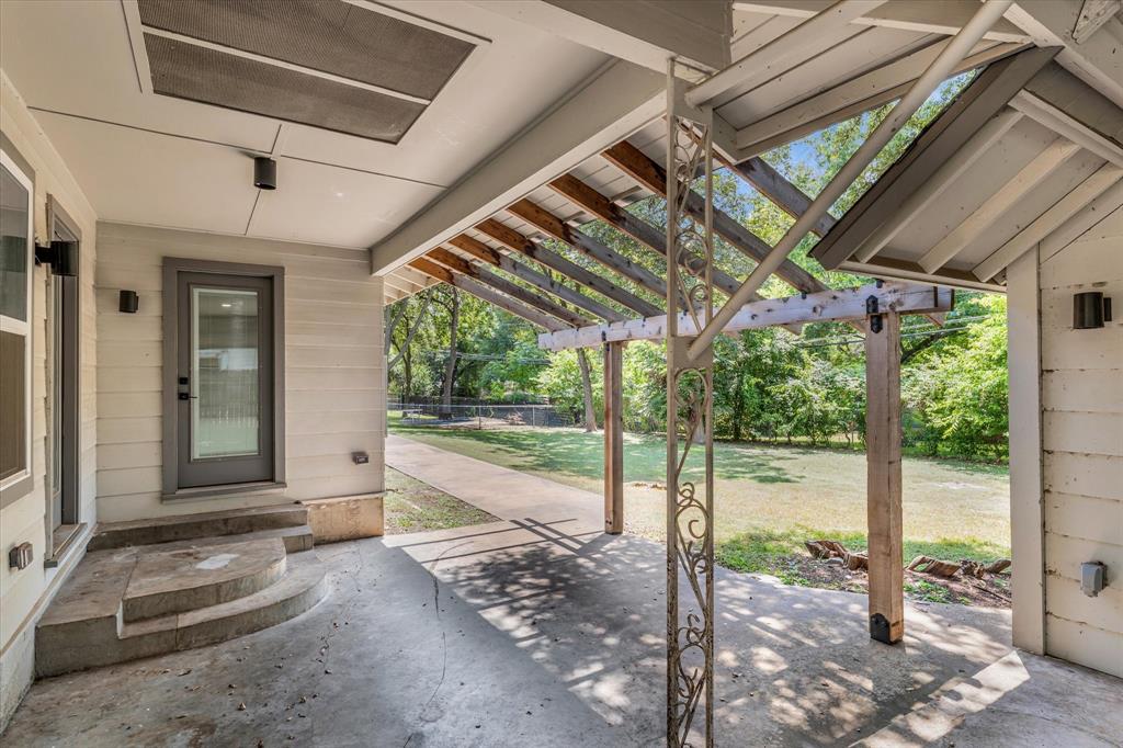 4600 Cedar Mountain Drive Waco, TX 76708 - Photo 26 of 33 a view of a porch with furniture and floor to ceiling window