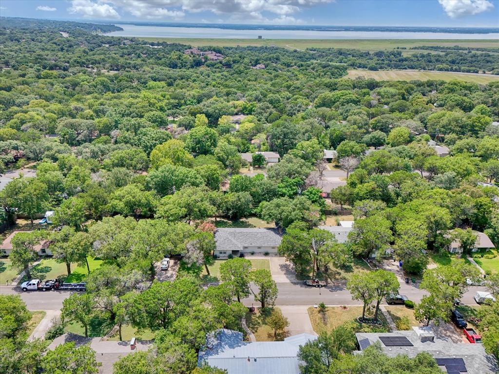 4600 Cedar Mountain Drive Waco, TX 76708 - Photo 29 of 33 a view of a garden with a building in the background