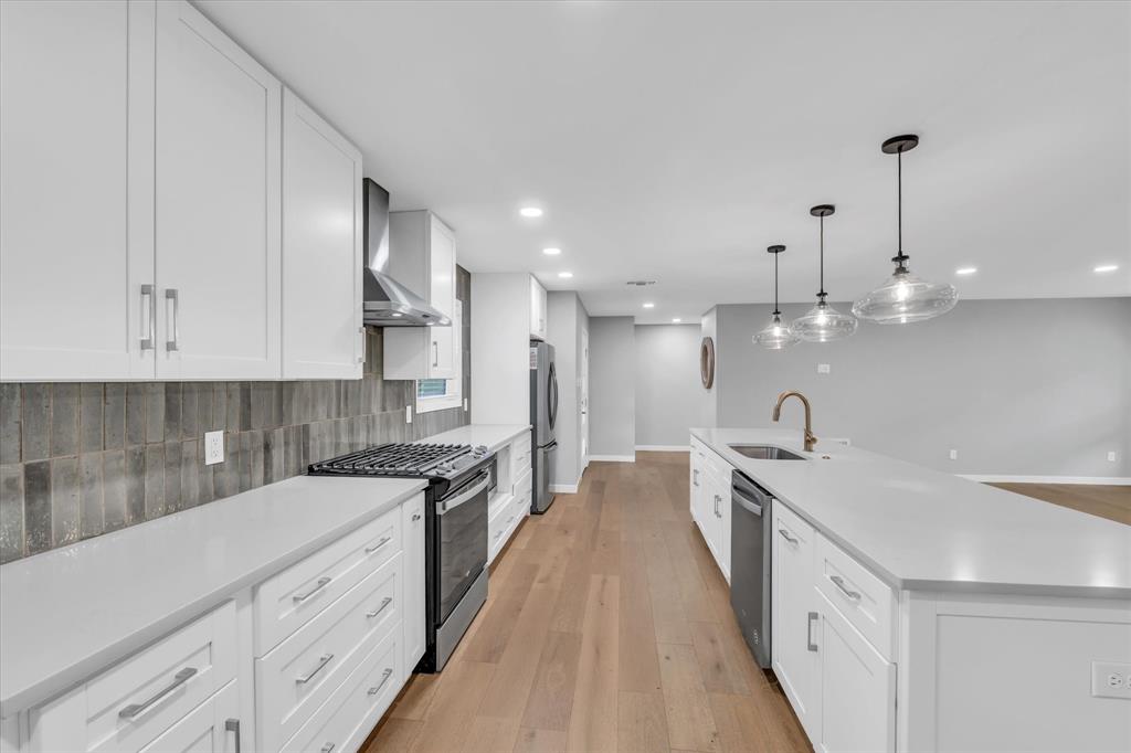 4600 Cedar Mountain Drive Waco, TX 76708 - Photo 8 of 33 a large kitchen with cabinets