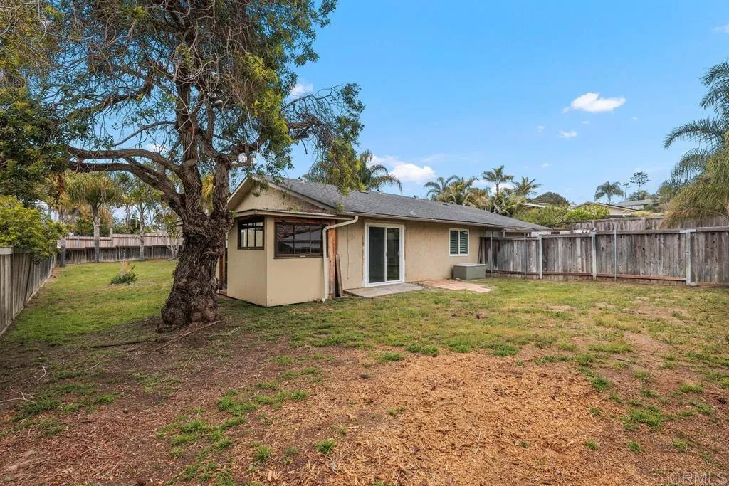 889 Bracero Road Encinitas, CA 92024 - Photo 24 of 59 a view of a house with a yard