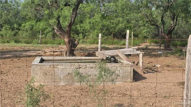 a view of yard with seating space