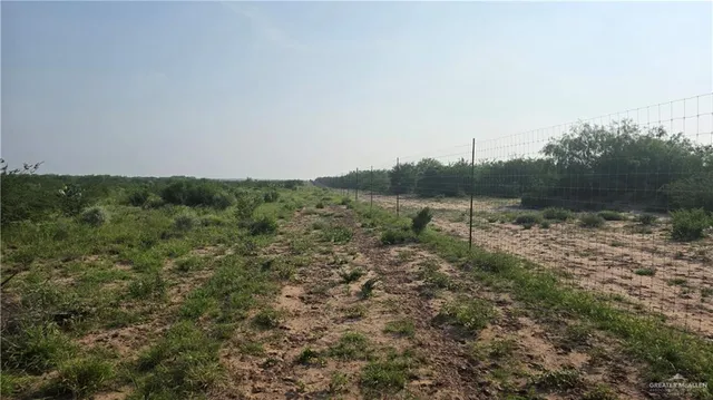 a view of a lake with houses in outdoor space