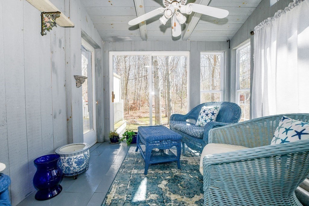 30 Clark Road Bourne, MA 02562 - Photo 17 of 40 a living room with furniture and a large window