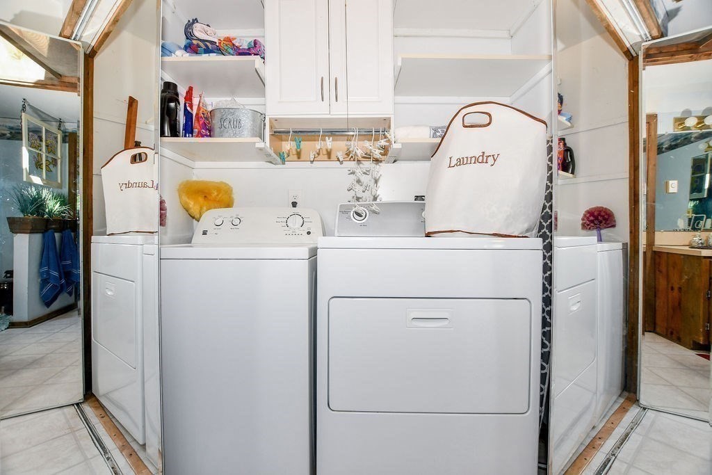 30 Clark Road Bourne, MA 02562 - Photo 29 of 40 a utility room with dryer and washer