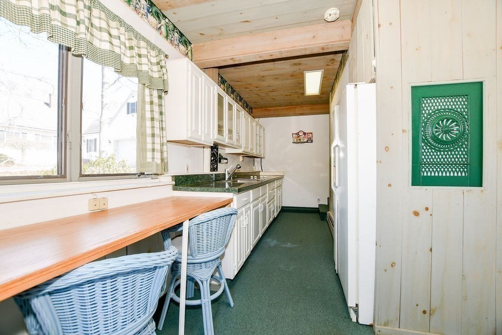 30 Clark Road Bourne, MA 02562 - Photo 30 of 40 a hallway with a large window